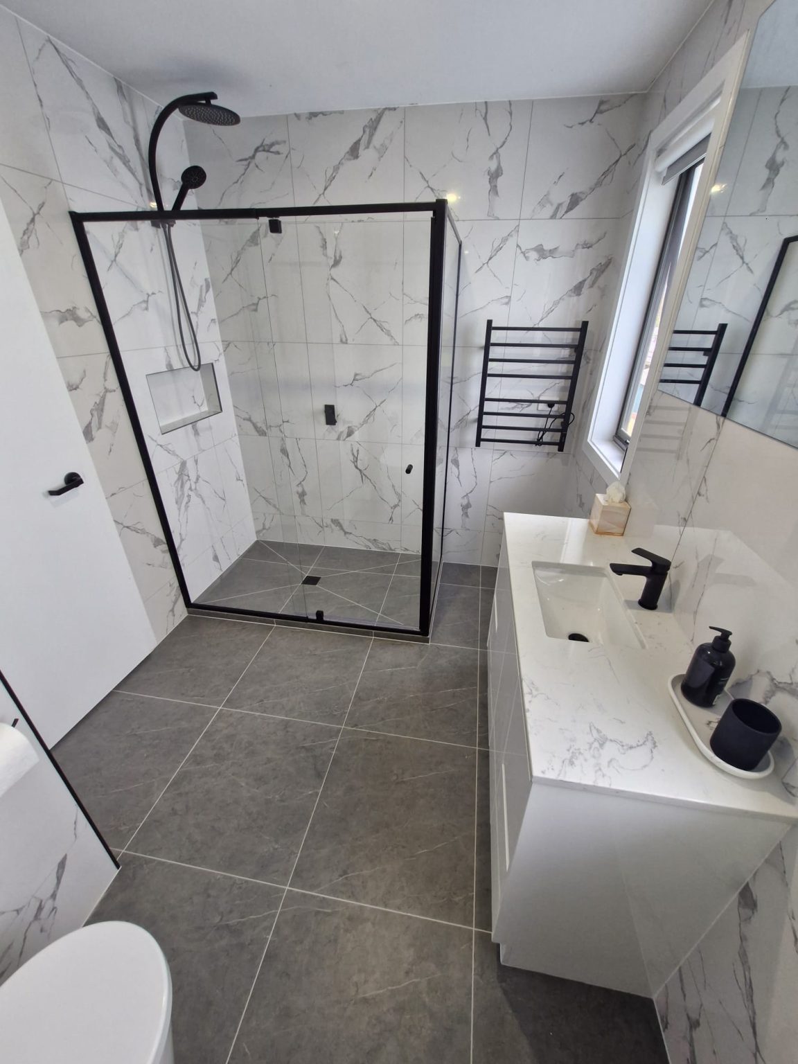 Space-efficient bathroom remodel for a Docklands apartment